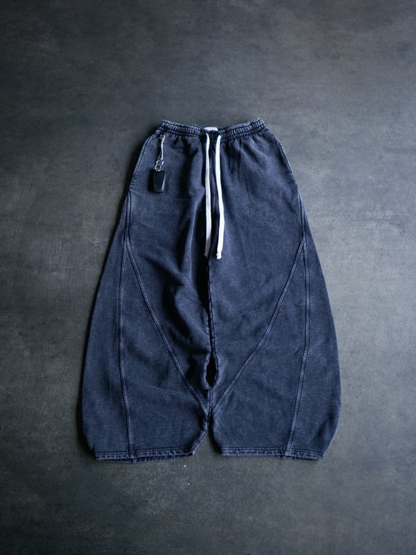 Goji Longevity black acid-washed wide-fit sweatpants — front view