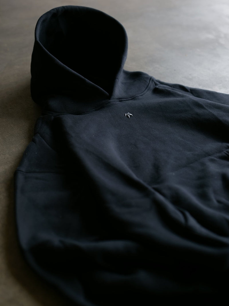 Goji Longevity jet black oversized cropped streetwear hoodie — detail view