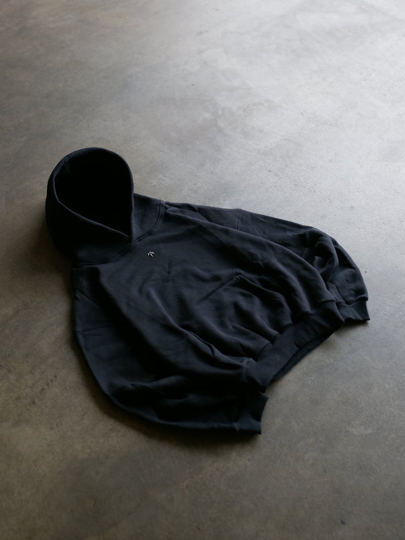 Goji Longevity jet black organic cotton hoodie — back view showing embroidery