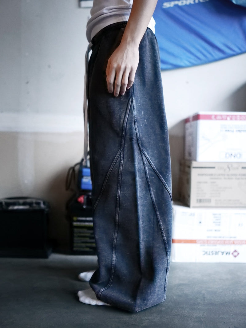 Goji Longevity black acid-washed unisex sweatpants — side profile